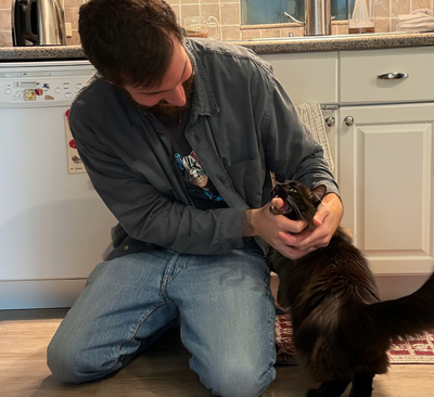 Simba drinking from water fountain